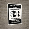 Vaccination Clinic: Immunizationdown Arrow Bilingual Spanish Portrait - Wall Sign