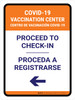 Covid-19 Vaccination Center: Proceed To Check In Left Arrow Bilingual Spanish Portrait - Wall Sign