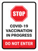 Stop: Covid-19 Vaccination In Progress Portrait - Wall Sign Stop: Covid-19 Vaccination In Progress Portrait - Wall Sign