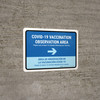 Covid-19 Vaccination Observation Area Blue Right Arrow Bilingual Spanish Landscape - Wall Sign Covid-19 Vaccination Observation Area Blue Right Arrow Bilingual Spanish Landscape - Wall Sign