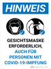 HINWEIS - Gesichtsmaske Erforderlich für Personen mit COVID-19-Imprung (Notice - Face Mask Required Even For Those With Vaccination) Portrait German - Wall Sign