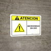 Caution: Microwave In Use Spanish ANSI - Wall Sign
