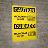 Caution: Microwave in Use Bilingual Spanish - Wall Sign