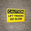 Caution: Lift Trucks Go Slow - Wall Sign