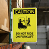 Caution: Do Not Ride on Forklift with Icon Portrait - Rack Mounted Sign