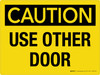 Caution: Use Other Door Landscape - Wall Sign