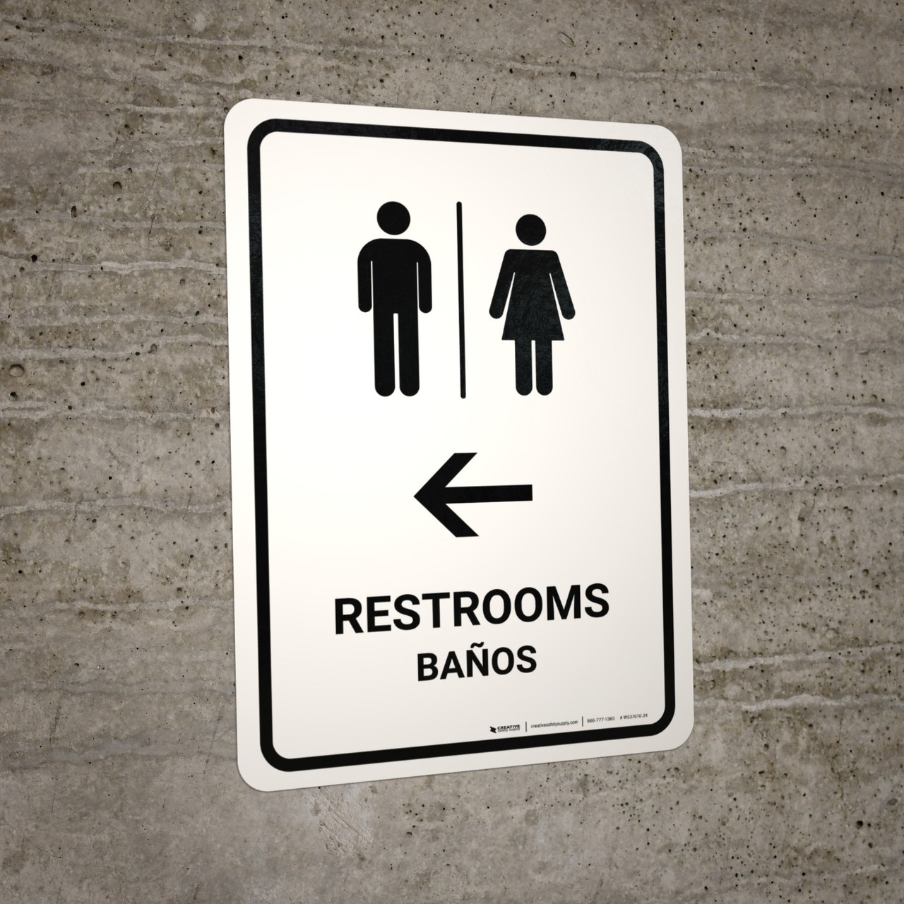Restrooms With Left Arrow White Bilingual Spanish Portrait - Wall Sign