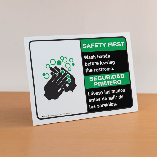 Safety First: Wash Your Hands Before Leaving Restroom Bilingual Spanish with Icon Landscape - Desktop Sign