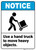 Notice: Use Hand Truck To Move Heavy Objects Person with Handtruck Icon Landscape ANSI - Wall Sign
