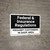 Federal And Insurance Regulations Prohibit Customes in Shop Landscape - Wall Sign