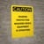Caution: Hearing Protection Required While Equipment Operating - Portrait Wall Sign