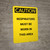 Caution: Respirators Must be Worn in This Area - Portrait Wall Sign
