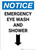 Notice: Emergency Eye Wash Station and Shower with Arrow Down Icon - Portrait Wall Sign