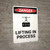 Lifting in Process - Portrait Wall Sign