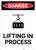 Lifting in Process - Portrait Wall Sign