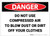 Danger: Do Not Use Compressed Air to Blow Dust or Dirt Off Clothes - Label
