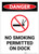 Danger: No Smoking Permitted On Dock With Symbol Portrait - Label