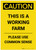 Caution: This Is A Working Farm Portrait - Label