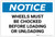 Notice: Wheels Must Be Chocked Before Loading Or Unloading - Label