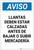 Notice: Wheels Must Be Chocked Before Loading Unloading Merchandise Spanish Portrait - Label