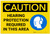 Caution: Hearing Protection Required In Area with Graphic - Label