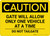 Caution: Gate Will Allow Only One Vehicle At a Time - Do Not Tailgate Landscape