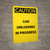 Caution: Car Unloading in Progress Portrait - Wall Sign