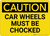 Caution: Car Wheels Must Be Chocked Landscape - Wall Sign