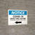Notice: COVID-19 Drive Thru Testing Left Arrow Landscape - Wall Sign