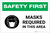 Safety First: Masks Required In This Area with Icon Landscape - Label