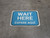 Wait Here Espere Aqui Bilingual Spanish Blue Rectangle - Floor Sign