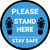 Please Stand Here Stay Safe Shoe Prints Blue Circular - Floor Sign