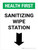 Health First: Sanitizing Wipe Station with Down Arrow Portrait - Wall Sign