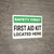 Safety First: First Aid Kit Located Here - Wall Sign