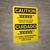Caution: Conveyor May Start Without Warning Bilingual Spanish With Icons - Wall Sign