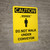 Caution: Do Not Walk Under Conveyor Portrait With Icon - Wall Sign