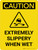 Caution: Extremely Slippery When Wet Portrait With Icon - Wall Sign