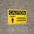 Caution: Overhead Conveyor Landscape With Icon - Wall Sign