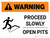 Warning: Proceed Slowly - Open Pits Landscape White With Icon - Wall Sign