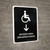 Handicapped Access With Down Arrow Black Spanish Portrait - Wall Sign