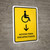 Handicapped Access With Down Arrow Yellow Spanish Portrait - Wall Sign