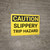 Caution: Slippery Trip Hazard - Wall Sign