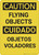 Caution: Flying Objects Bilingual Spanish - Wall Sign