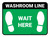 Wait Here: Washroom Line Green Rectangle - Floor Sign