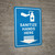 Sanitize Hands Here with Arrow Down Blue Portrait - Wall Sign