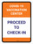 Covid-19 Vaccination Center: Proceed To Check In Portrait - Wall Sign