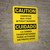 Caution: Conveyor May Start Without Warning Bilingual Spanish Portrait - Wall Sign