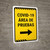 Covid-19 Testing Area Yellow Right Arrow Spanish Portrait - Wall Sign