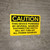 Caution: This Device Powered By Several Sources - Wall Sign