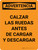 Advertencia - Calzar las Ruedas al Cargar y Descargar Vertical - Wall Sign